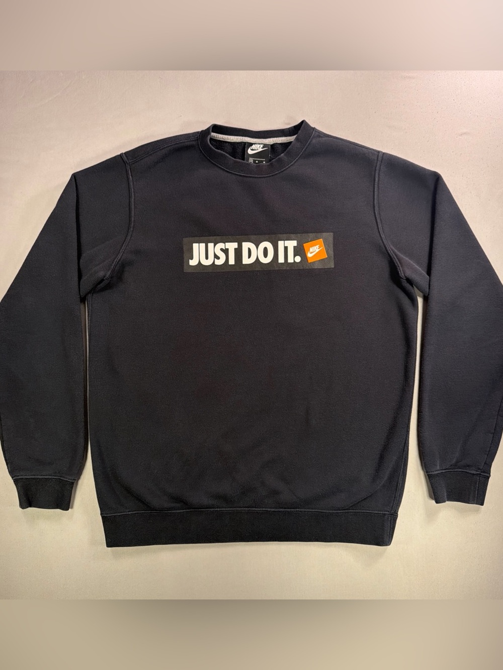 Nike Black Crewneck Sweatshirt with White 'Just Do It.' Box and Orange Tag
